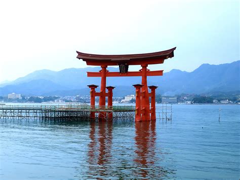 Miyajima Floating Torii Gate: Mist-Shrouded Symbolism and Ancient Island Charm!