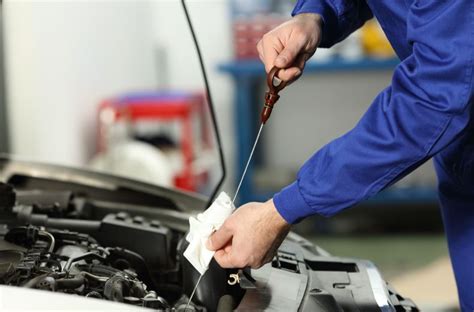 Should Your Car Be Running When You Check the Oil?